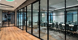 Glass partitions and office walls in a commercial interior